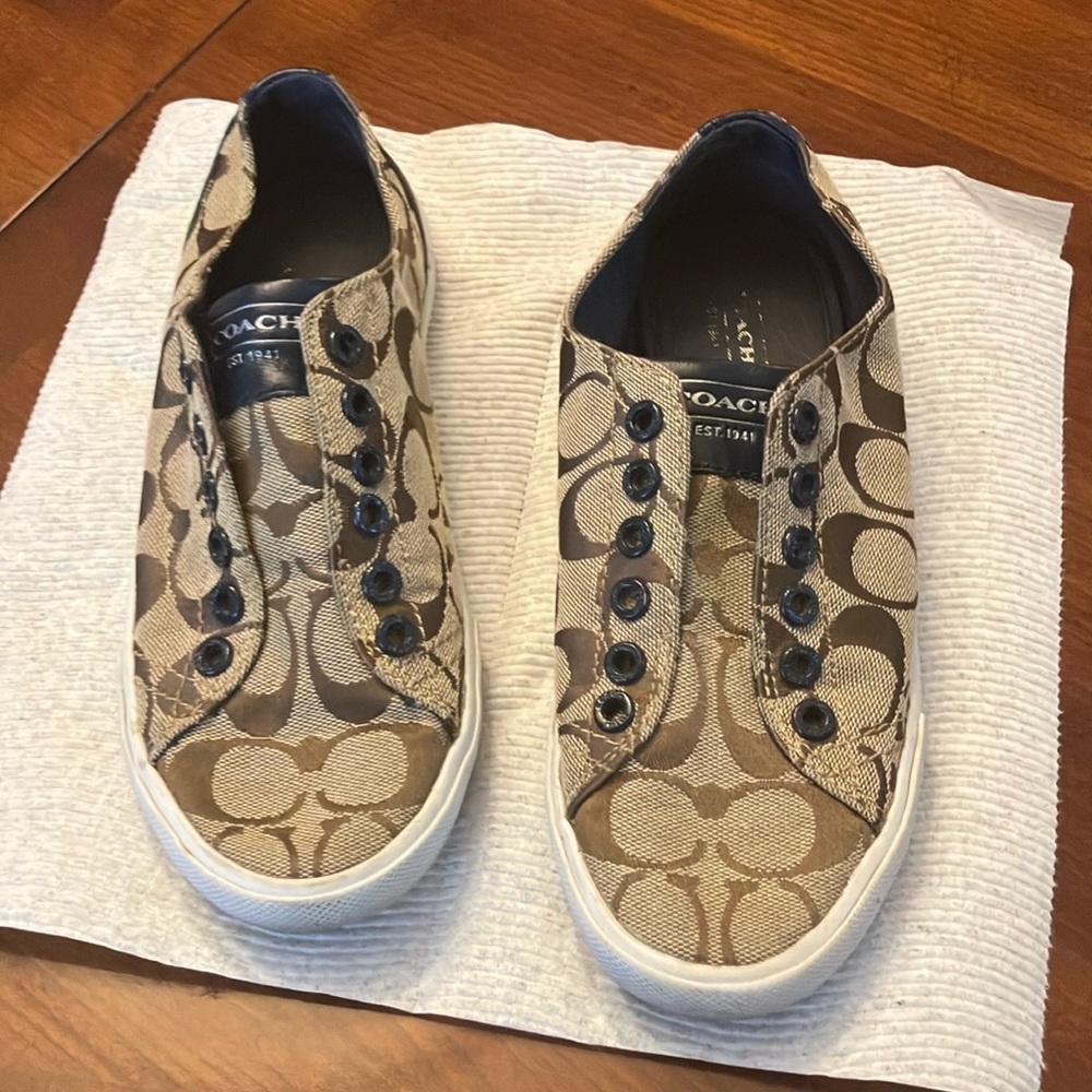 COACH SNEAKERS. SIZE 6. TAN & NAVY. USED BUT A LOT OF LIFE LEFT. SOLES ARE GOOD!